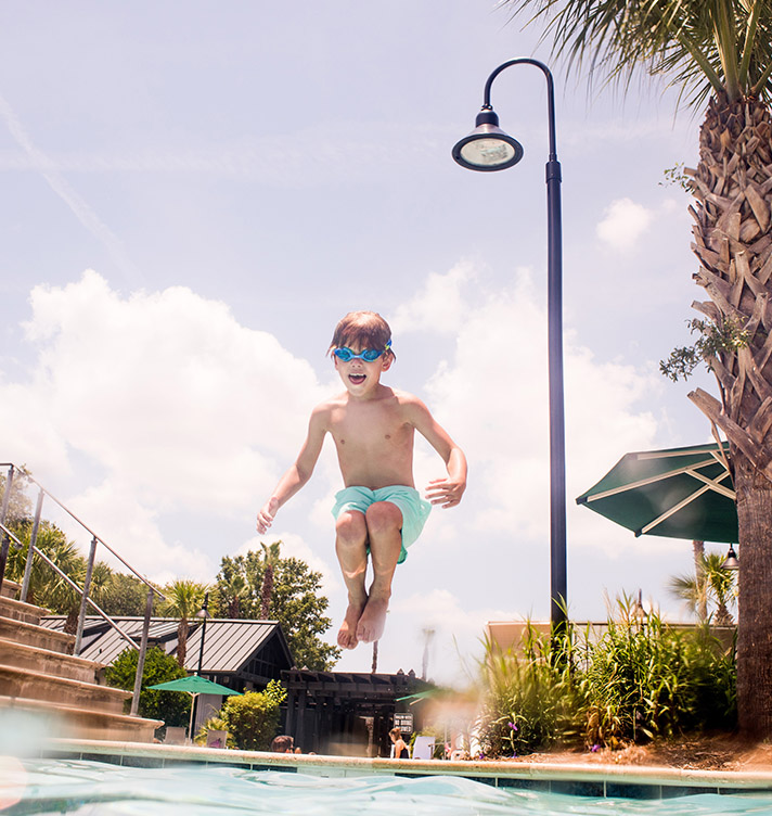 Kid Jumping in Pool